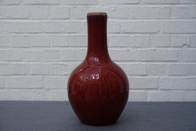 A Chinese monochrome oxblood-glazed bottle vase, 19th C.